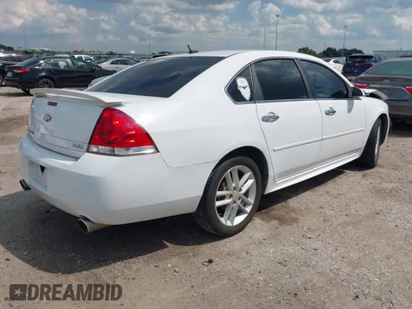 2012 Chevrolet Impala LTZ with VIN 2G1WC5E30C1138334, listed as a IAAI auction lot 43107686 with 193,149 mi miles and . Bid and sale history available at DreamBid. Image 4.