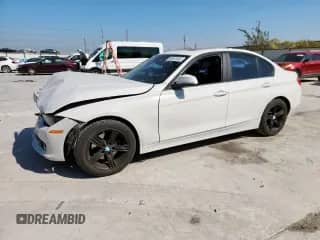 2014 BMW 3 Series 320i with VIN WBA3B1G55ENT01174, listed as a Copart auction lot 85941935 with 145,559 mi miles and Salvage title. Bid and sale history available at DreamBid. Image 1.