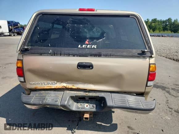 2002 Toyota Tundra SR5 z VIN 5TBRN34102S254202, wystawiony jako Copart lot #71814075 z przebiegiem 167 582 mil mil oraz Szkoda całkowita • Salvage title. Historia ofert i sprzedaży dostępna na DreamBid. Obrazek 6.