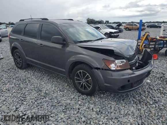 2018 Dodge Journey SE with VIN 3C4PDCABXJT447072, listed as a Copart auction lot 82191755 with 107,733 mi miles and Salvage title. Bid and sale history available at DreamBid. Image 4.