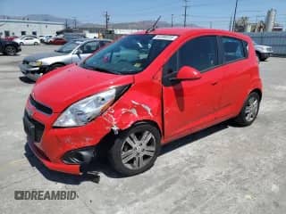 2015 Chevrolet Spark LT с VIN KL8CD6S99FC746818, выставлен на аукционе Copart как лот 68389335 с пробегом 65 967 миль миль и Списание • Salvage title. История ставок и продаж доступна на DreamBid. Изображение 1.
