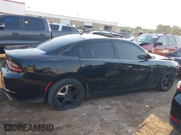 2019 Dodge Charger SXT with VIN 2C3CDXBGXKH655581, listed as a IAAI auction lot 42929168 with 112,379 mi miles and . Bid and sale history available at DreamBid. Image 14.