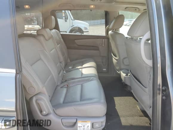 2013 Honda Odyssey Touring с VIN 5FNRL5H98DB018851, выставлен на аукционе Copart как лот 67395825 с пробегом 110 129 миль миль и Списание • Salvage title. История ставок и продаж доступна на DreamBid. Изображение 11.