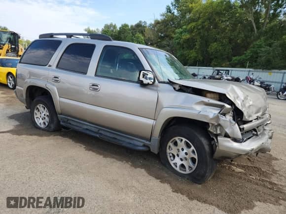 2003 Chevrolet Tahoe LT с VIN 1GNEK13Z63R264928, выставлен на аукционе Copart как лот 84194675 с пробегом 270 361 миль миль и Списание • Salvage title. История ставок и продаж доступна на DreamBid. Изображение 4.
