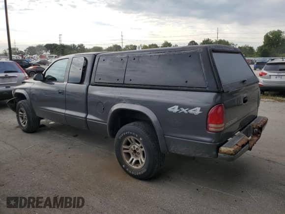 2004 Dodge Dakota with VIN 1D7HG32K24S651547, listed as a Copart auction lot 80031045 with 157,257 mi miles and Salvage title. Bid and sale history available at DreamBid. Image 2.
