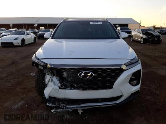 2020 Hyundai Santa Fe Limited with VIN 5NMS53AD1LH165881, listed as a Copart auction lot 70551872 with 24,357 mi miles and . Bid and sale history available at DreamBid. Image 5.