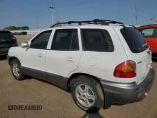 2003 Hyundai Santa Fe GLS с VIN KM8SC73D73U471997, выставлен на аукционе Copart как лот 71192494 с пробегом 102 923 миль миль и Списание • Salvage title. История ставок и продаж доступна на DreamBid. Изображение 2.