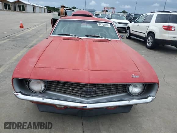 1969 Chevrolet Camaro с VIN 123379N533684, выставлен на аукционе Copart как лот 74764744 с пробегом 91 198 миль миль и Списание • Salvage title. История ставок и продаж доступна на DreamBid. Изображение 5.
