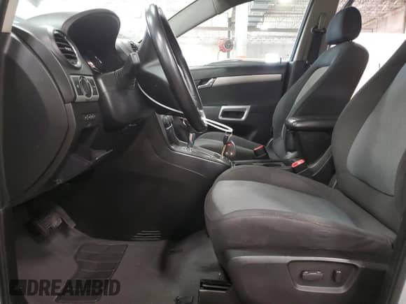 2012 Chevrolet Captiva Sport LS with VIN 3GNAL2EK4CS591729, listed as a Copart auction lot 77488834 with 182,738 mi miles and Salvage title. Bid and sale history available at DreamBid. Image 7.