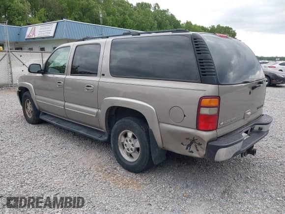 2003 Chevrolet Suburban LT with VIN 1GNEC16Z13J140136, listed as a IAAI auction lot 42142827 with 252,698 mi miles and . Bid and sale history available at DreamBid. Image 3.
