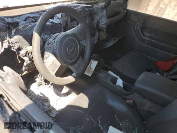 2012 Jeep Wrangler Sport z VIN 1C4AJWAGXCL219342, wystawiony jako Copart lot #71405885 z przebiegiem Nie podano mil oraz Nie do naprawy • Non repairable. Historia ofert i sprzedaży dostępna na DreamBid. Obrazek 8.