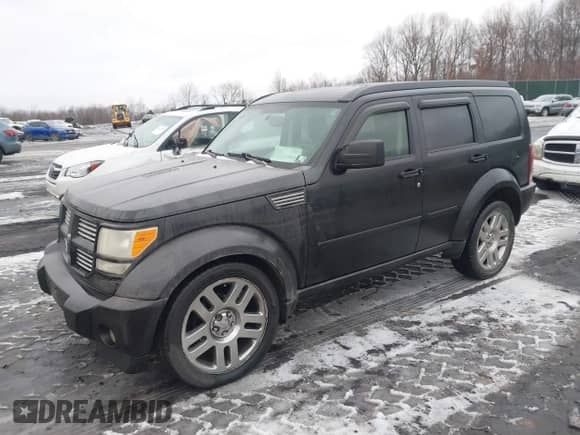 2008 Dodge Nitro R/T z VIN 1D8GU58608W151438, wystawiony jako IAAI lot #41515503 z przebiegiem 123 777 mil mil oraz . Historia ofert i sprzedaży dostępna na DreamBid. Obrazek 2.