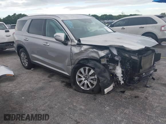 2025 Hyundai Palisade SEL z VIN KM8R24GE2SU868132, wystawiony jako IAAI lot #43424990 z przebiegiem 21 349 mil mil oraz . Historia ofert i sprzedaży dostępna na DreamBid. Obrazek 1.