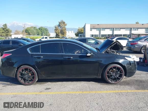 2009 Acura TL Technology с VIN 19UUA86599A022166, выставлен на аукционе IAAI как лот 43467655 с пробегом 197 933 миль миль и . История ставок и продаж доступна на DreamBid. Изображение 13.