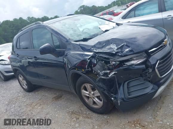 2022 Chevrolet Trax LT with VIN KL7CJPSM1NB534507, listed as a IAAI auction lot 42988585 with 58,401 mi miles and . Bid and sale history available at DreamBid. Image 13.