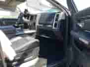 2015 Ram 1500 Laramie Limited with VIN 1C6RR7PT5FS552426, listed as a IAAI auction lot 42039997 with 167,944 mi miles and . Bid and sale history available at DreamBid. Image 5.