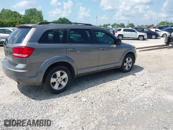 2012 Dodge Journey American Value with VIN 3C4PDCAB8CT241137, listed as a IAAI auction lot 42518243 with 204,512 mi miles and . Bid and sale history available at DreamBid. Image 4.