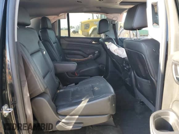 2016 Chevrolet Suburban LTZ с VIN 1GNSKJKC1GR238999, выставлен на аукционе Copart как лот 71281475 с пробегом 100 657 миль миль и Списание • Salvage title. История ставок и продаж доступна на DreamBid. Изображение 11.