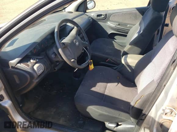 2002 Dodge Neon with VIN 1B3ES26C32D583044, listed as a Copart auction lot 74057444 with 205,484 mi miles and Salvage title. Bid and sale history available at DreamBid. Image 7.