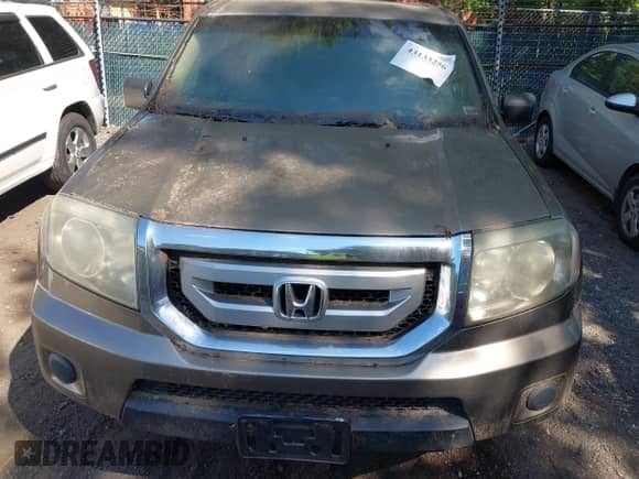 2010 Honda Pilot LX with VIN 5FNYF3H28AB009931, listed as a IAAI auction lot 43133256 with 149,119 mi miles and . Bid and sale history available at DreamBid. Image 6.
