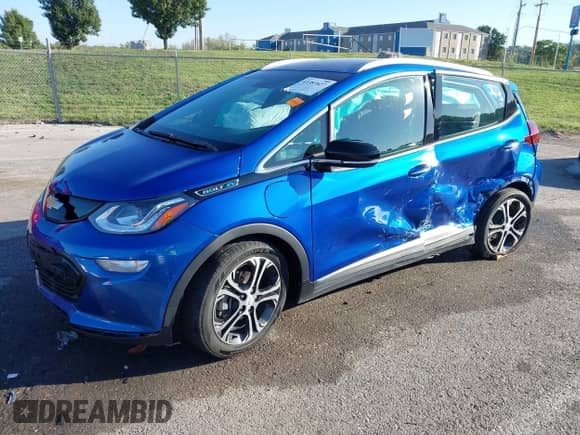 2018 Chevrolet Bolt EV Premier with VIN 1G1FX6S06J4115274, listed as a IAAI auction lot 43381827 with 64,638 mi miles and . Bid and sale history available at DreamBid. Image 21.
