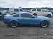 2007 Ford Mustang GT Deluxe z VIN 1ZVFT82HX75216807, wystawiony jako IAAI lot #43383897 z przebiegiem 132 000 mil mil oraz . Historia ofert i sprzedaży dostępna na DreamBid. Obrazek 13.