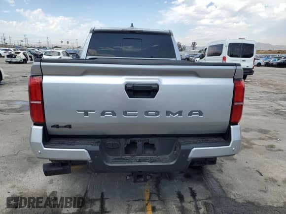 2024 Toyota Tacoma SR5 with VIN 3TMLB5JN4RM025038, listed as a Copart auction lot 70888755 with 20,056 mi miles and Salvage title. Bid and sale history available at DreamBid. Image 6.