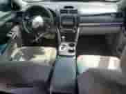 2014 Toyota Camry L with VIN 4T1BF1FK4EU765987, listed as a Copart auction lot 69086495 with 209,272 mi miles and Salvage title. Bid and sale history available at DreamBid. Image 8.