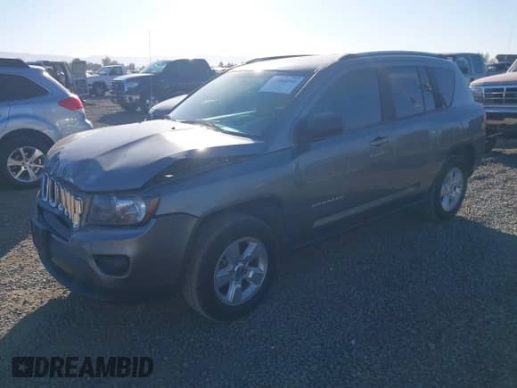 2014 Jeep Compass Sport with VIN 1C4NJCBA8ED617995, listed as a IAAI auction lot 42964160 with 187,897 mi miles and . Bid and sale history available at DreamBid. Image 2.