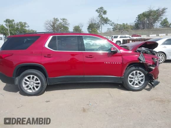 2021 Chevrolet Traverse LT Cloth z VIN 1GNEVGKW6MJ240355, wystawiony jako IAAI lot #43337703 z przebiegiem 38 563 mil mil oraz . Historia ofert i sprzedaży dostępna na DreamBid. Obrazek 14.