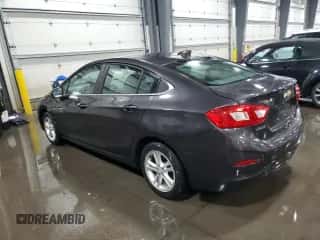 2016 Chevrolet Cruze LT z VIN 1G1BE5SM1G7256858, wystawiony jako Copart lot #82095885 z przebiegiem 154 026 mil mil oraz Szkoda całkowita • Salvage title. Historia ofert i sprzedaży dostępna na DreamBid. Obrazek 2.