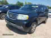 2014 Honda Pilot Touring with VIN 5FNYF3H98EB007678, listed as a IAAI auction lot 43156695 with 246,974 mi miles and . Bid and sale history available at DreamBid. Image 2.