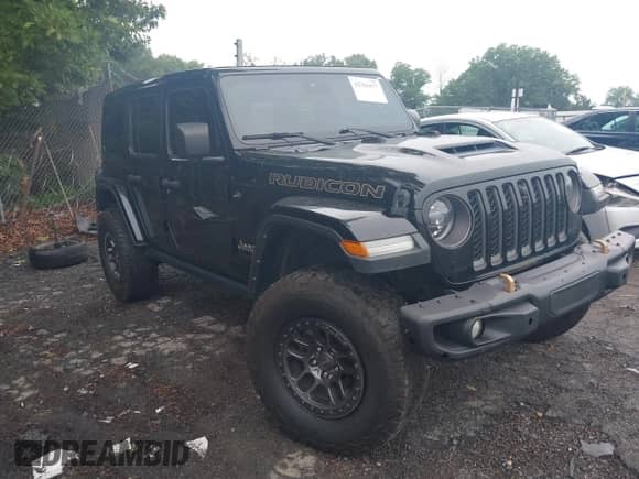 2021 Jeep Wrangler Unlimited Rubicon 392 with VIN 1C4JJXSJ3MW699790, listed as a IAAI auction lot 42328477 with 12,170 mi miles and . Bid and sale history available at DreamBid. Image 1.