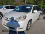 2009 Toyota Sienna XLE with VIN 5TDZK22CX9S232491, listed as a IAAI auction lot 43389674 with 298,733 mi miles and . Bid and sale history available at DreamBid. Image 2.