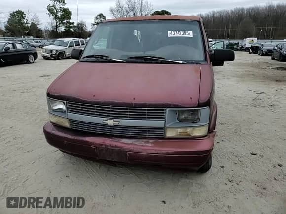 1996 Chevrolet Astro z VIN 1GNDM19W2TB176437, wystawiony jako Copart lot #43742395 z przebiegiem 213 464 mil mil oraz Szkoda całkowita • Salvage title. Historia ofert i sprzedaży dostępna na DreamBid. Obrazek 11.