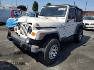1999 Jeep Wrangler Sport с VIN 1J4FY19S3XP460794, выставлен на аукционе Copart как лот 84594705 с пробегом 211 690 миль миль и Списание • Salvage title. История ставок и продаж доступна на DreamBid. Изображение 1.