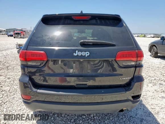 2016 Jeep Grand Cherokee Laredo with VIN 1C4RJEAG0GC415616, listed as a Copart auction lot 69056645 with 113,617 mi miles and Clean title. Bid and sale history available at DreamBid. Image 6.