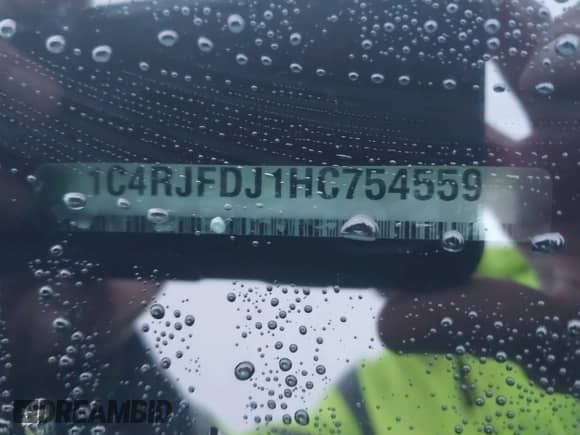 2017 Jeep Grand Cherokee SRT with VIN 1C4RJFDJ1HC754559, listed as a IAAI auction lot 41461029 with 100,096 mi miles and . Bid and sale history available at DreamBid. Image 9.