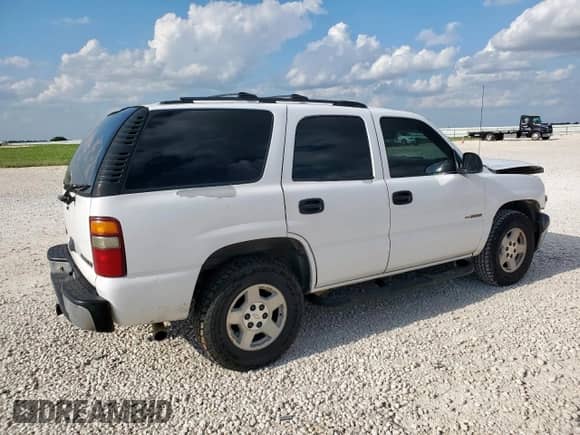 2001 Chevrolet Tahoe LS с VIN 1GNEC13T21R204764, выставлен на аукционе Copart как лот 70886525 с пробегом 211 367 миль миль и Списание • Salvage title. История ставок и продаж доступна на DreamBid. Изображение 3.