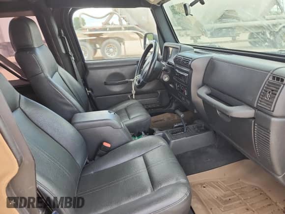 2003 Jeep Wrangler X z VIN 1J4FA39S33P356428, wystawiony jako Copart lot #70285135 z przebiegiem 147 788 mil mil oraz Szkoda całkowita • Salvage title. Historia ofert i sprzedaży dostępna na DreamBid. Obrazek 10.