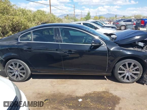 2015 Volvo S60 T5 Drive-E Premier with VIN YV140MFB3F2299721, listed as a IAAI auction lot 42013732 with 82,407 mi miles and . Bid and sale history available at DreamBid. Image 13.