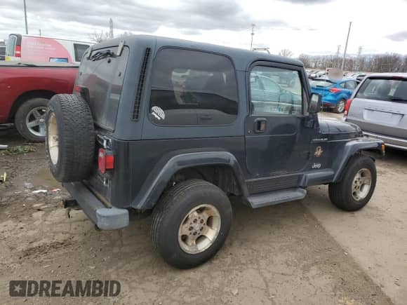 2002 Jeep Wrangler Sahara с VIN 1J4FA59S42P776905, выставлен на аукционе Copart как лот 53373015 с пробегом 231 915 миль миль и Чистый • Clean title. История ставок и продаж доступна на DreamBid. Изображение 3.