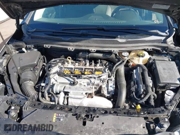 2018 Chevrolet Cruze LS z VIN 1G1BC5SM8J7156155, wystawiony jako IAAI lot #43294819 z przebiegiem 70 176 mil mil oraz . Historia ofert i sprzedaży dostępna na DreamBid. Obrazek 10.