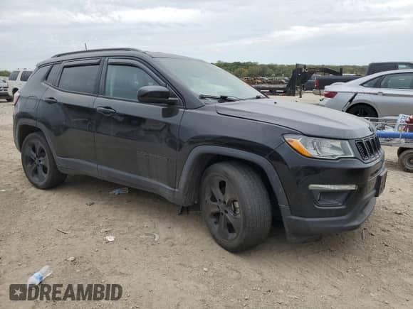 2019 Jeep Compass Altitude with VIN 3C4NJCBB2KT706637, listed as a Copart auction lot 86140265 with 161,415 mi miles and Salvage title. Bid and sale history available at DreamBid. Image 4.