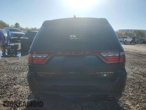 2017 Dodge Durango Citadel with VIN 1C4RDJEG1HC623208, listed as a Copart auction lot 82325275 with 112,323 mi miles and Salvage title. Bid and sale history available at DreamBid. Image 6.