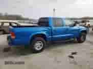 2000 Dodge Dakota Sport z VIN 1B7GG2AN0YS699193, wystawiony jako Copart lot #51438325 z przebiegiem 127 106 mil mil oraz Szkoda całkowita • Salvage title. Historia ofert i sprzedaży dostępna na DreamBid. Obrazek 3.