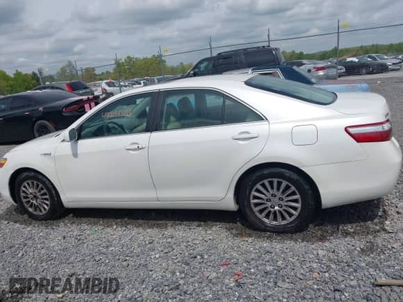 2007 Toyota Camry z VIN 4T1BB46K77U015340, wystawiony jako IAAI lot #42204728 z przebiegiem 121 409 mil mil oraz . Historia ofert i sprzedaży dostępna na DreamBid. Obrazek 14.