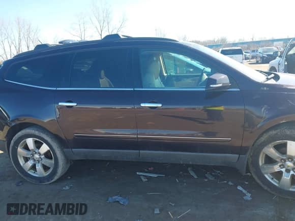 2009 Chevrolet Traverse LTZ z VIN 1GNER33D19S150882, wystawiony jako IAAI lot #41803912 z przebiegiem 156 229 mil mil oraz . Historia ofert i sprzedaży dostępna na DreamBid. Obrazek 13.