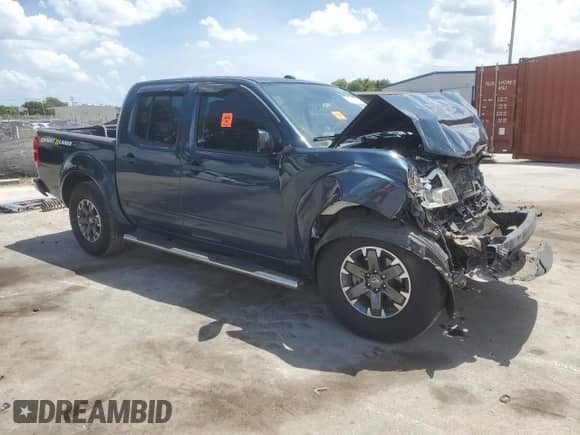 2017 Nissan Frontier Desert Runner with VIN 1N6DD0ER6HN744632, listed as a Copart auction lot 60755185 with 87,037 mi miles and Salvage title. Bid and sale history available at DreamBid. Image 4.