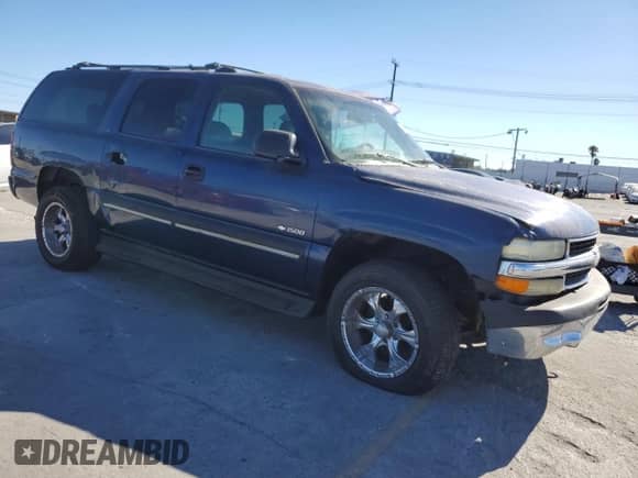 2000 Chevrolet Suburban LS с VIN 3GNEC16T7YG229228, выставлен на аукционе Copart как лот 71917695 с пробегом 190 311 миль миль и Списание • Salvage title. История ставок и продаж доступна на DreamBid. Изображение 4.